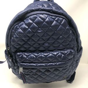 Like new Oliver Thomas blue  mini backpack